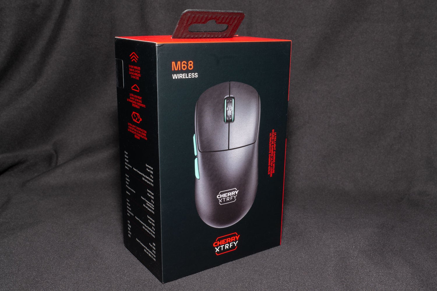 The outer packaging of the M68 Wireless from the front left