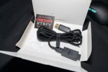 M68 Wireless accessories consisting of charging cable, replacement gliding feet and XTRFY stickers