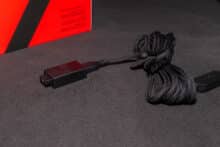 The assembled USB dongle with charging cable