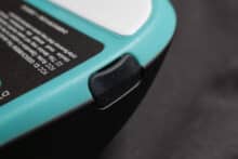 The cover of the USB-C port on the right-hand side of the housing