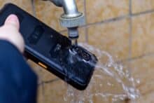 Smartphone is washed with water