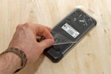 Protective film around smartphone is removed