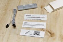 USB stick, cable and piece of paper