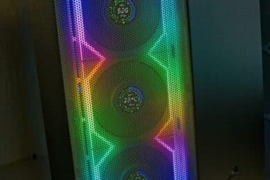 Lian Li Uni Fan SL Wireless LCD behind a mesh panel