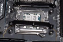 AM5 socket with mounted spacers and adjacent mounting brackets