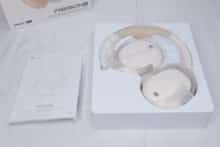 The contents of the Edifier W830NB packaging in plastic bags