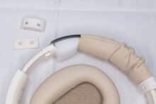 The partially removed cover of the headband upholstery