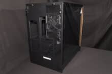 A 120mm housing fan and many large ventilation openings are located at the rear