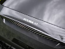 Carbon fiber design with model lettering