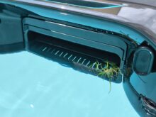 The dirt particles are sucked in.