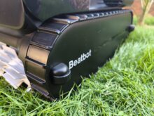 Crawler belt with side support roller