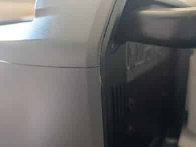 Close-up of an unclean material edge with a frayed, uneven gap