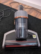 Jimmy BX7 Pro Max in front view with dust container and control element on the handle.