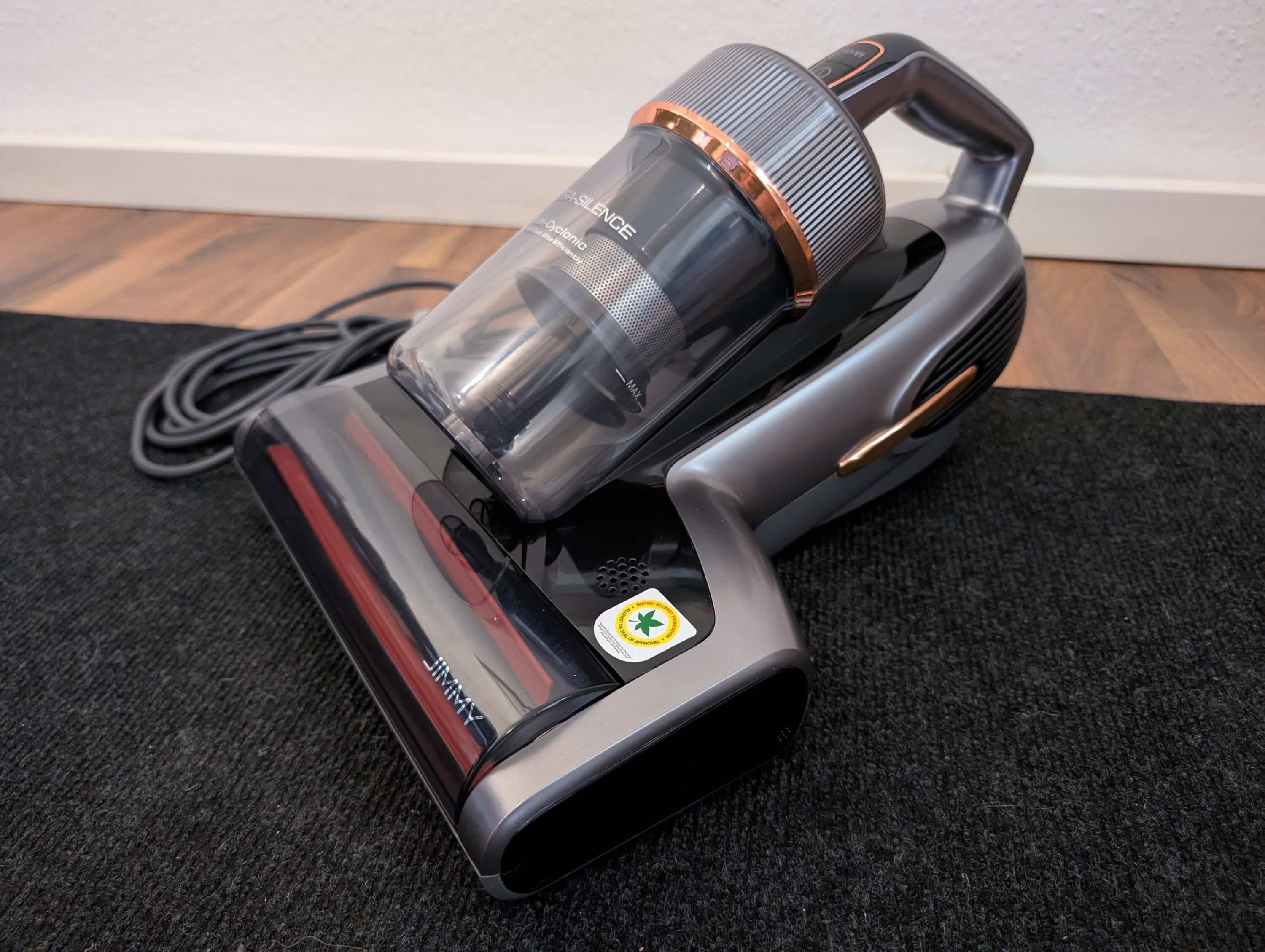 Jimmy BX7 Pro Max dust mite vacuum cleaner with cyclone container on carpeted floors.