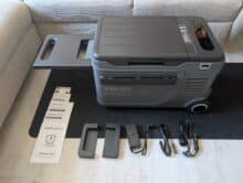 Anker Solix EverFrost 2 23L with unfolded table, accessories and instructions side by side on the floor