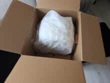 Base station of the Roborock Qrevo CurvX in protective film in the box