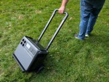 DJI Power 2000 Powerstation on the hand truck during transportation over grass