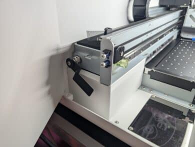 Opened left maintenance door on the Procolored P13 with a view of the film guide and mechanics