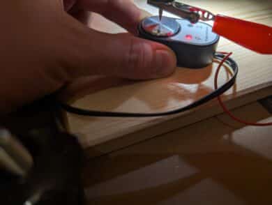 TwoTrees TTC-6050 Z-axis measuring tool with red LED when approaching a wooden workpiece