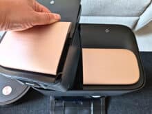 Hand removes the waste water tank from the Yeedi S16 Plus OMNI station